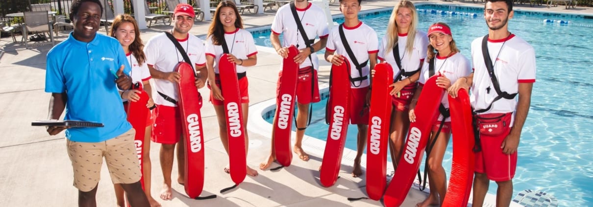 photo of a group of lifeguards at a summer community pool