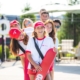 line of lifeguards at a swimming pool
